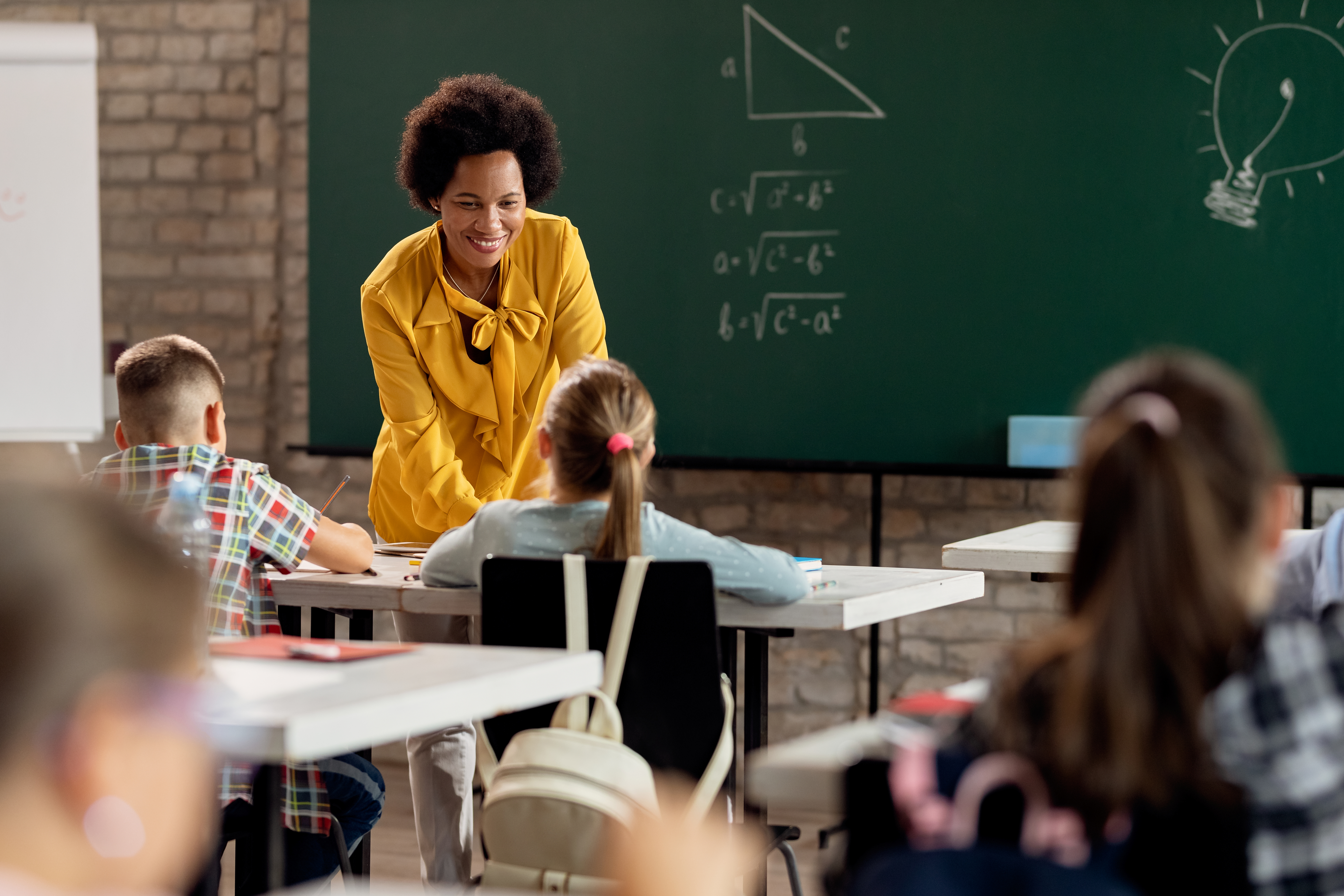 Teacher with students
